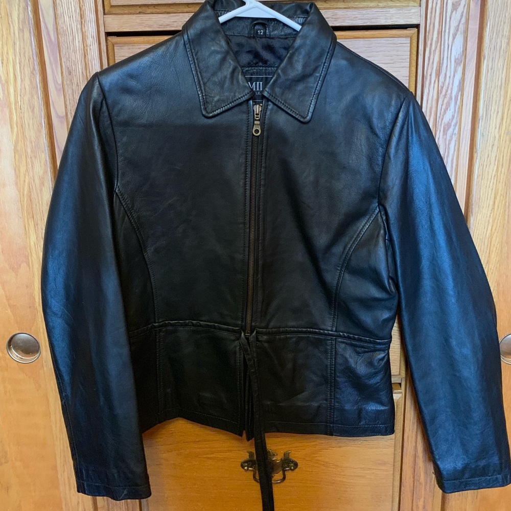 Black leather jacket. Mint condition. Fits like 6